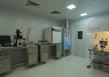 doctor using a microscope